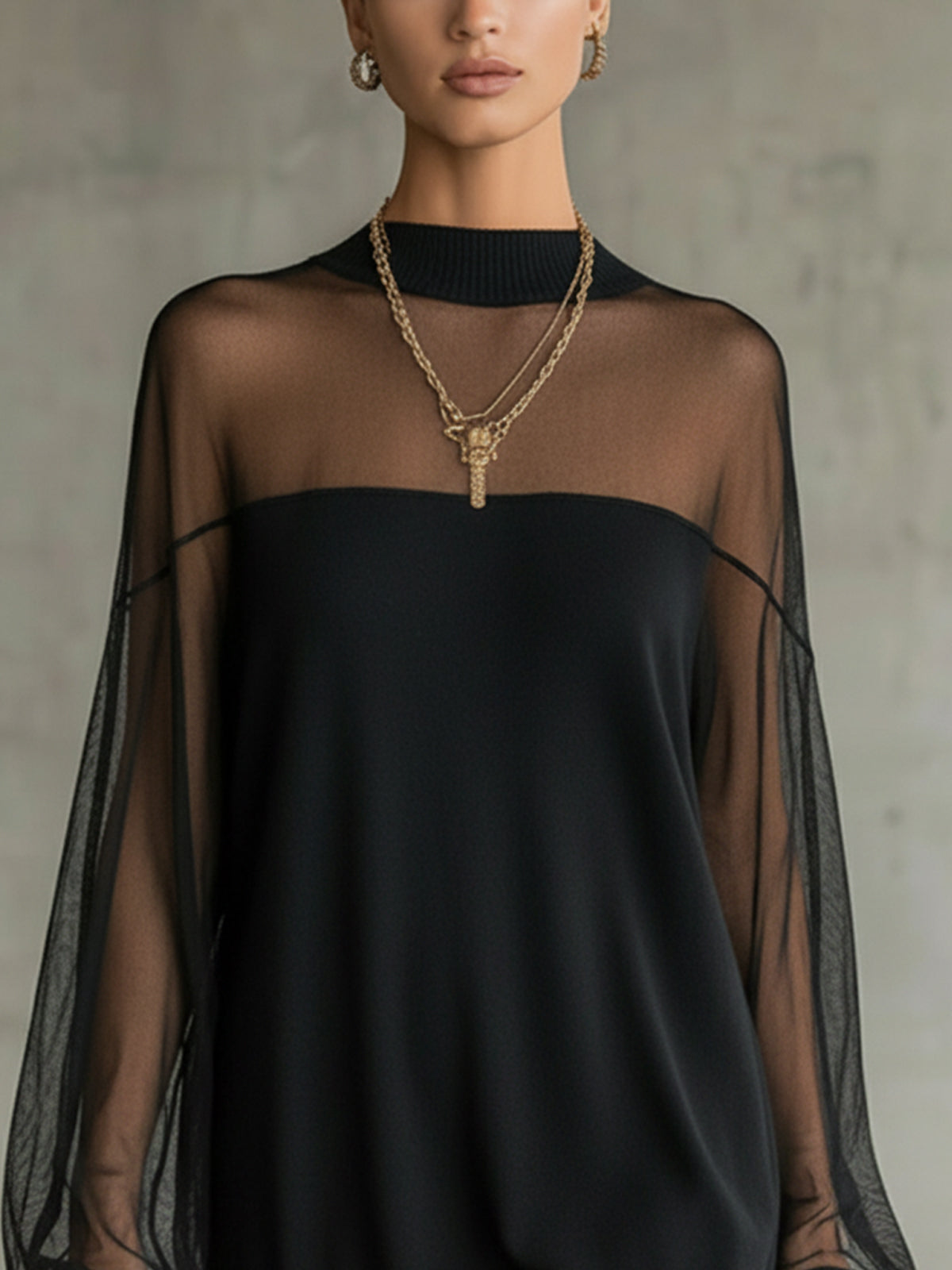 Amelia™ | Elegante minivestido negro con mangas de red